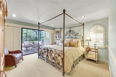 Set across two private, meticulously landscaped lots inside the - photo 21