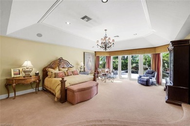 Set across two private, meticulously landscaped lots inside the - photo 23