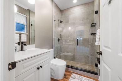 This two-story home is perfectly situated in a charming coastal - photo 24