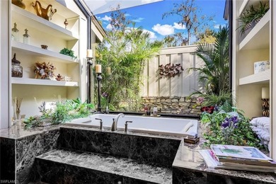 Set across two private, meticulously landscaped lots inside the - photo 25