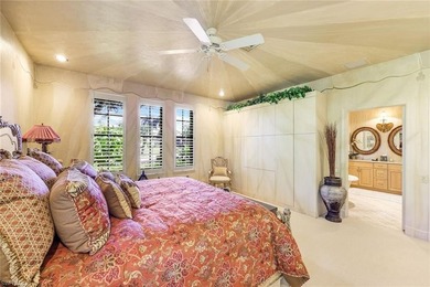 Set across two private, meticulously landscaped lots inside the - photo 31