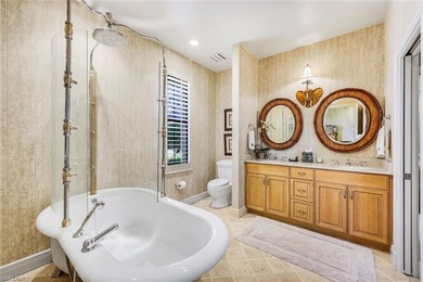 Set across two private, meticulously landscaped lots inside the - photo 32