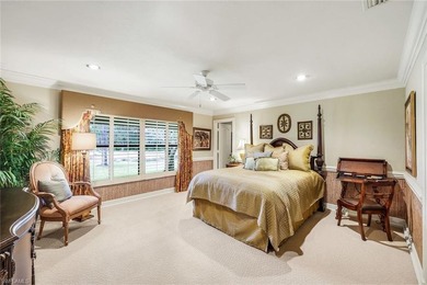 Set across two private, meticulously landscaped lots inside the - photo 33