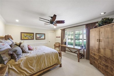 Set across two private, meticulously landscaped lots inside the - photo 34