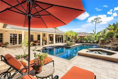 Set across two private, meticulously landscaped lots inside the - photo 36