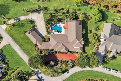 Set across two private, meticulously landscaped lots inside the - photo 38