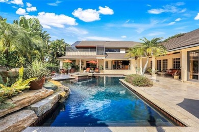 Set across two private, meticulously landscaped lots inside the - photo 41