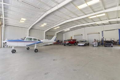 Nestled in the prestigious Pine Shadows Airpark, 3561 Downwind - photo 7