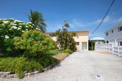 Waterfront duplex located on a wide, deep boating canal with - photo 1
