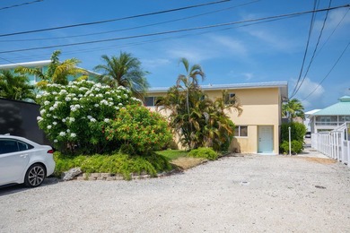 Waterfront duplex located on a wide, deep boating canal with - photo 2