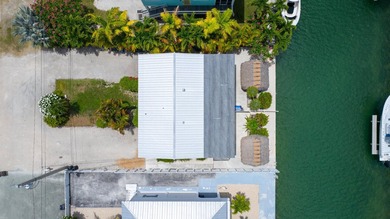 Waterfront duplex located on a wide, deep boating canal with - photo 3