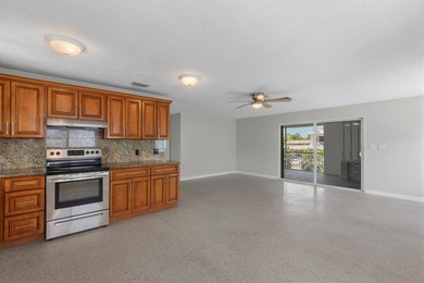 Waterfront duplex located on a wide, deep boating canal with - photo 8