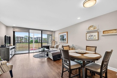 This turnkey 55+ condo is nestled within the sought-after - photo 1