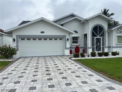 17550 Fan Palm Court in Sabal Springs is an immaculate - photo 1
