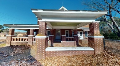 Built in 1905, this solid brick home offers a rare opportunity - photo 38
