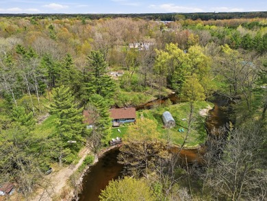 Nestled on approximately 3.2 acres with Tamarack Creek--a - photo 4