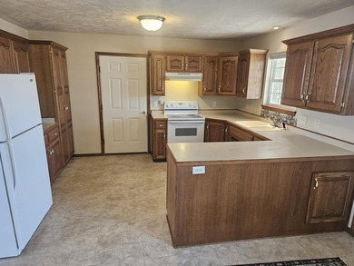 1,255 Square foot home with an open floor plan has a vaulted - photo 8