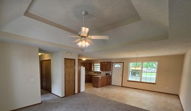1,255 Square foot home with an open floor plan has a vaulted - photo 10