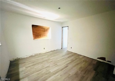 Property requires a full renovation. Damage includes missing - photo 10