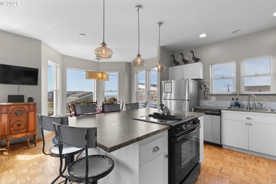 Located in the heart of Nye Beach, this one-of-a-kind property