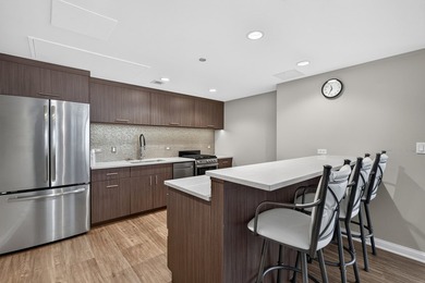 Experience refined & luxurious city living in this beautifully - photo 26