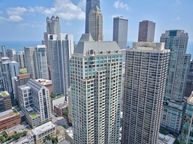 Experience refined & luxurious city living in this beautifully - photo 32