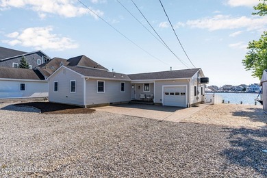 Waterfront Living at Its Finest in Green Island! Wake up every - photo 1
