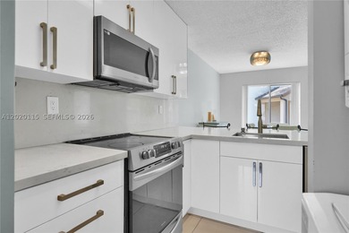 Great first-floor one-bedroom, one-bathroom unit located in the - photo 3