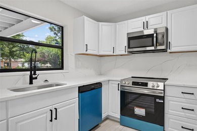 Welcome to this beautifully renovated 3-bedroom, 2-bathroom home - photo 8