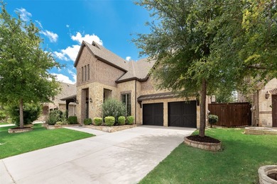 This well-maintained brick-and-stone home offers a tandem 3-car - photo 3