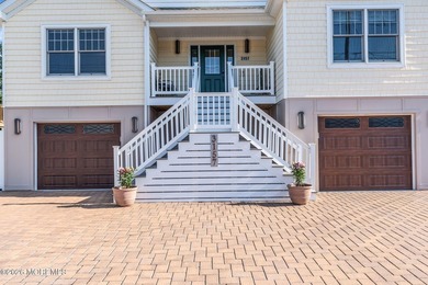 Custom-built in 2023 with water views, this meticulously - photo 3