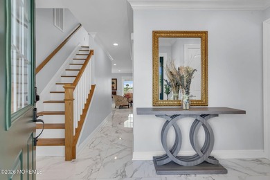 Custom-built in 2023 with water views, this meticulously - photo 5
