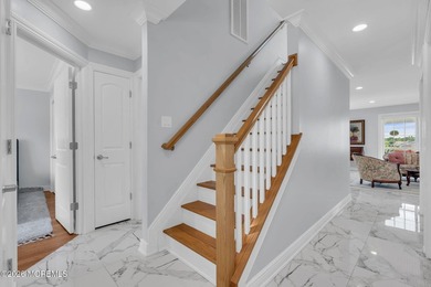 Custom-built in 2023 with water views, this meticulously - photo 6