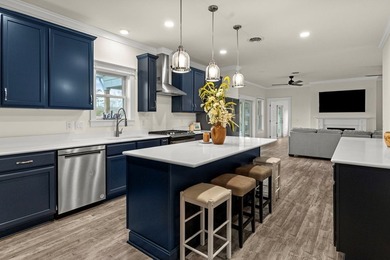 Enjoy effortless waterfront living on Greenvale Creek, just off - photo 5