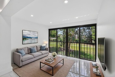 ABSOLUTELY STUNNING FULLY RENOVATED CONDO | BOCA LAGO COMMUNITY - photo 8
