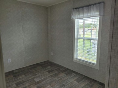 Own your own home in a quiet, well-maintained 55+ neighborhood! - photo 12