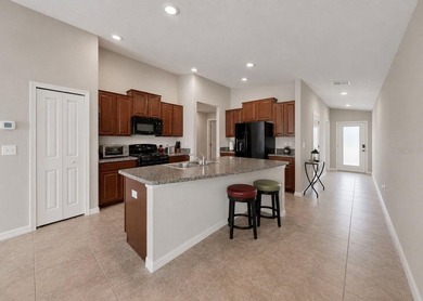 Situated on a perfectly manicured lot with serene and private - photo 5