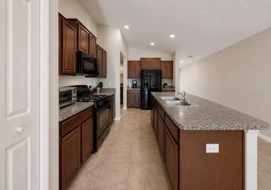 Situated on a perfectly manicured lot with serene and private - photo 8