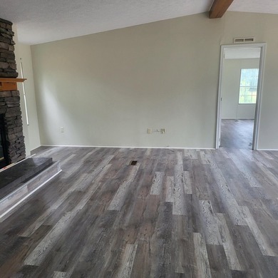Welcome to this 1,900-square-foot mobile home situated on 5 - photo 3