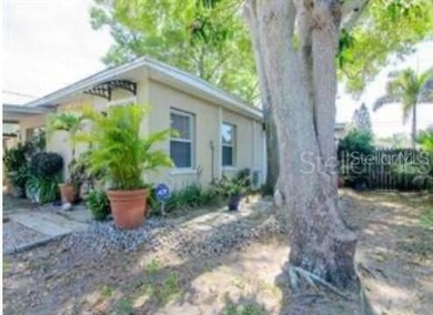 Discover a unique opportunity in Gulfport: this 4-bedroom - photo 4