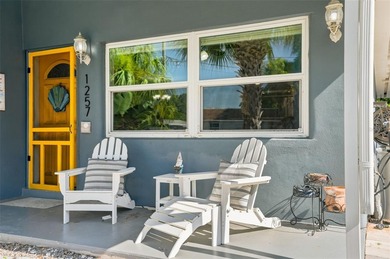 Perfectly capturing the charm of a Key West-style bungalow while - photo 4