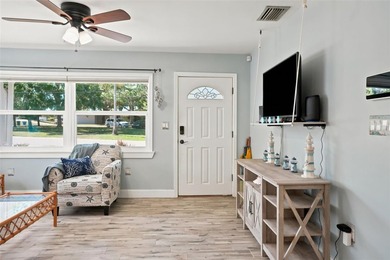 Perfectly capturing the charm of a Key West-style bungalow while - photo 7