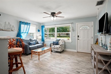 Perfectly capturing the charm of a Key West-style bungalow while - photo 9
