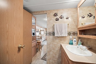 Check out this 2-bed, 1-bath camper overlooking Cokato Lake - photo 12