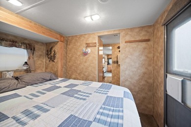 Check out this 2-bed, 1-bath camper overlooking Cokato Lake - photo 14
