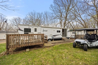 Check out this 2-bed, 1-bath camper overlooking Cokato Lake - photo 16