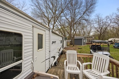 Check out this 2-bed, 1-bath camper overlooking Cokato Lake - photo 22