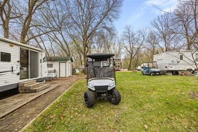 Check out this 2-bed, 1-bath camper overlooking Cokato Lake - photo 23