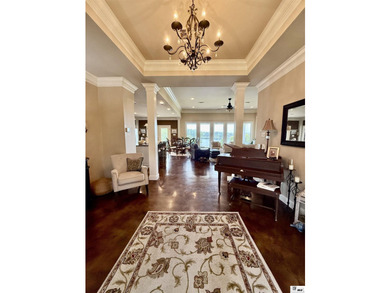 Nestled on a hilltop, this stunning lake home offers expansive - photo 6