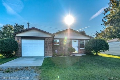Lake Home For Sale in Harrison Township, Michigan